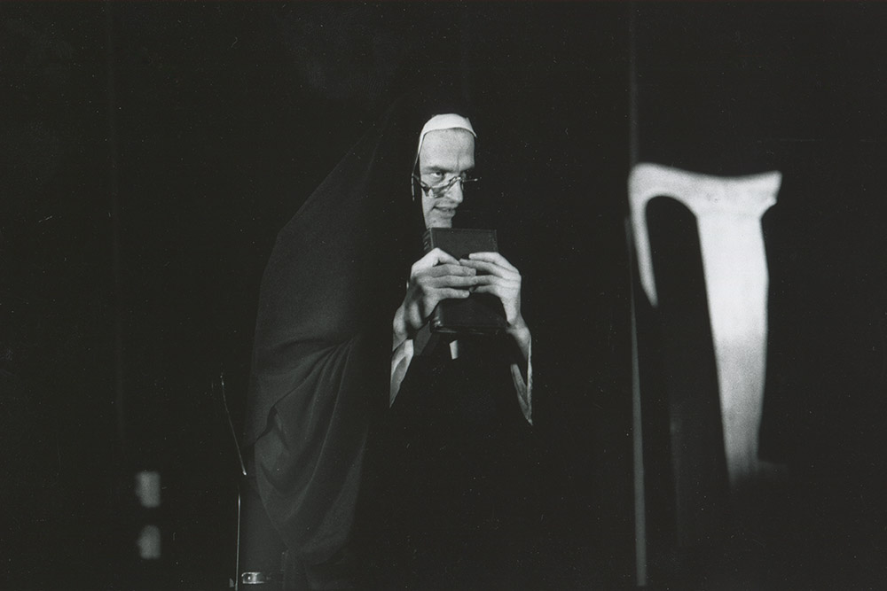 Production still for "The Chronicle of Macbeth". Bruce Naylor as a Believer. Photographer: Reimund Zunde