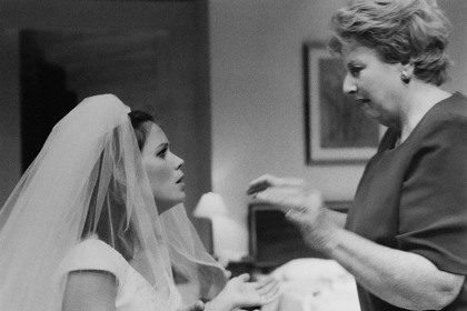 Production still for "Secret Bridesmaids' Business". L-R: Jane Hall as Meg Bacon, Joan Sydney as Colleen Bacon. Photographer: Jeff Busby