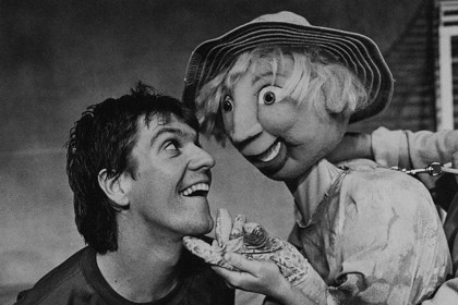 Production still for "Wilfrid Gordon Macdonald Partridge". Syd Brisbane with puppet. Photographer: Jeff Busby