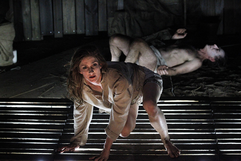 Production still for "The Plague Dances". Esther Hannaford as Hannelore, Matt Crosby (rear). Photographer: Jeff Busby