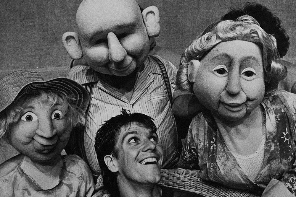Production still for "Wilfrid Gordon Macdonald Partridge". Syd Brisbane with puppets. Photographer: Jeff Busby