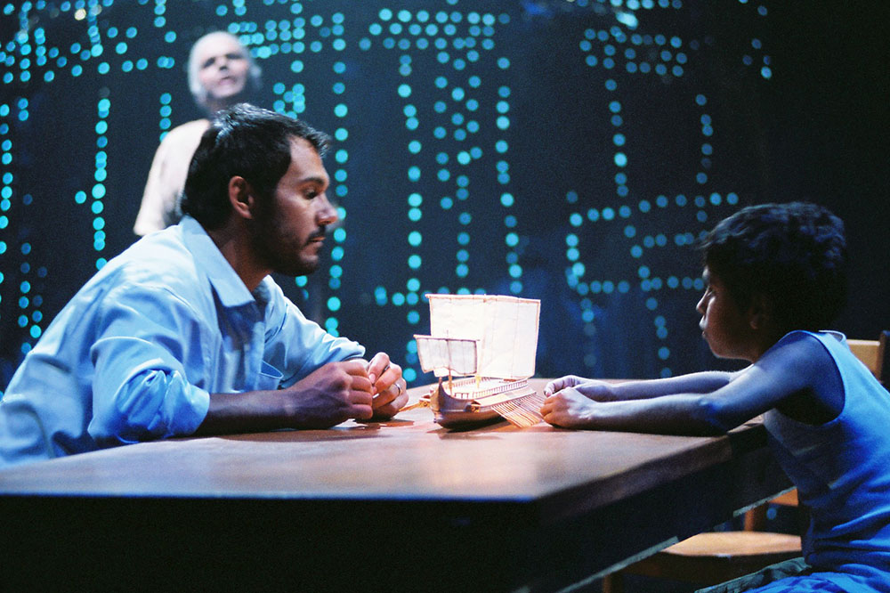 Production still for Belvoir St production of "Black Medea". L-R: Justine Saunders as the Chrous, Aaron Pederson as Jason. Photographer: Heidrun Lohr