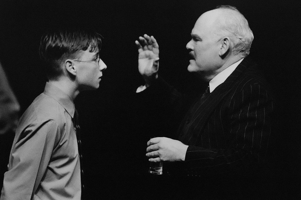 Production still for "A Happy and Holy Occasion". L-R: James McKenna as Christy O'Mahon, Malcolm Robertson as Vincent de Paul (Houses) O'Halloran. Photographer: Jeff Busby
