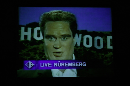 Production still for "The Big Con". Max Gillies as Arnold Schwarzenegger. Photographer: Lisa Tomasetti