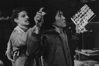 Production still for "Luck of the Draw". L-R: John Walker as John, Tran Minh Nam as Khan. Photographer: David B. Simmonds