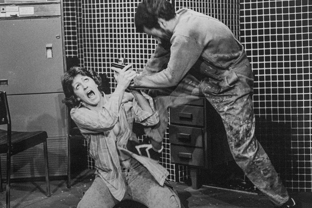 Production still for "Interrogation of Angel". L-R: Cheryl Heazlewood as Rita, Gary Samolin as John Kenny. Photographer: David Parker