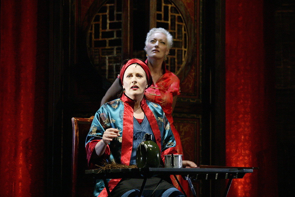 Production still for "Minefields and Miniskirts" (2004). L-R: Debra Byrne as The Nurse, Tracy Bartram as The Journalist. Photographer: Lisa Tomasetti