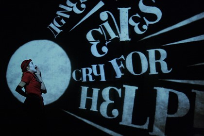 Production still for "The Animals and Children Took to the Streets". Lillian Henley. Photo credit: 1927