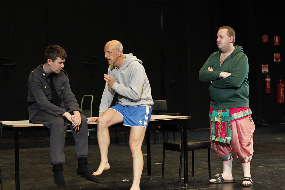 Production still for "Ganesh Versus The Third Reich". L-R: Scott Price, David Woods, Brian Tilley. Photographer: Jeff Busby