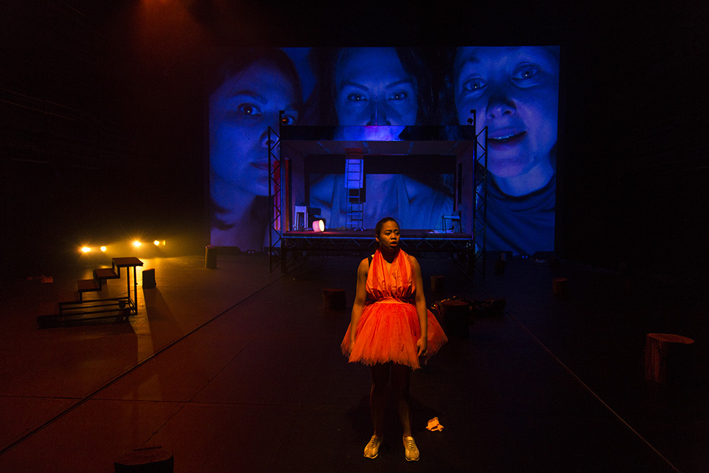 Production still for "Revolt. She Said. Revolt Again." Front: Elizabeth Esguerra. Rear L-R: Ming-Zhu Hii, Belinda McClory, Sophie Ross. Photographer: Pia Johnson