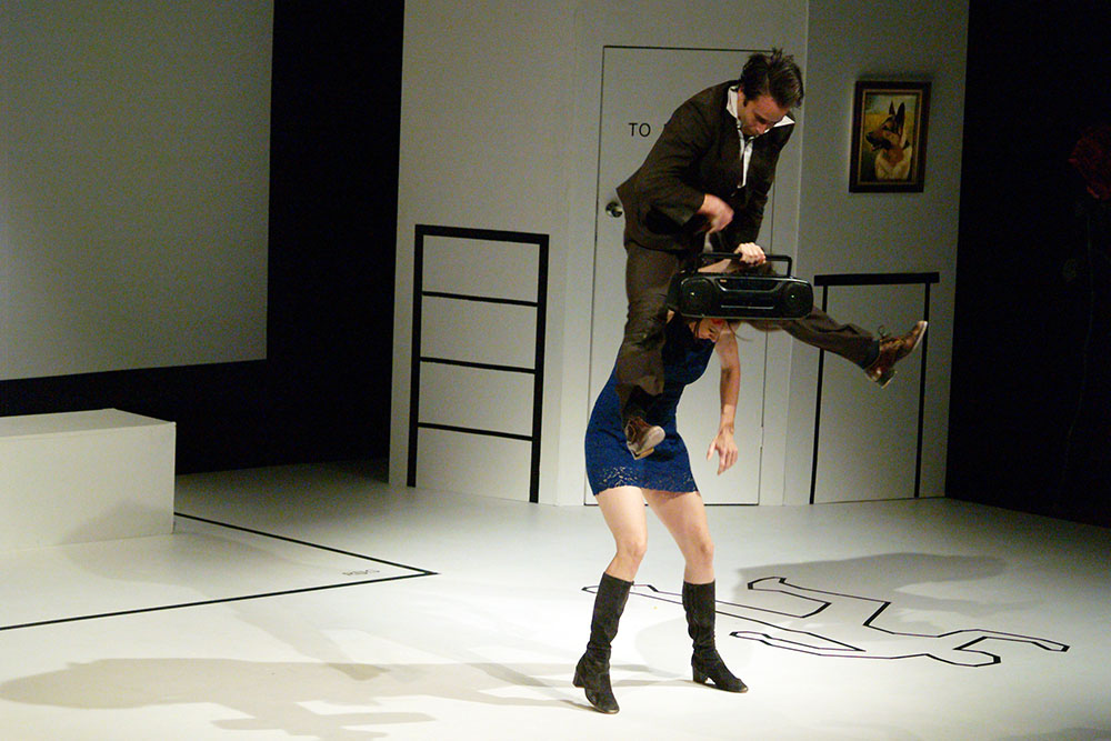 Production still for previous production of "Blue Love". Veronica Neave (standing), Shaun Parker. Photo credit: The Esplanade Co. Ltd