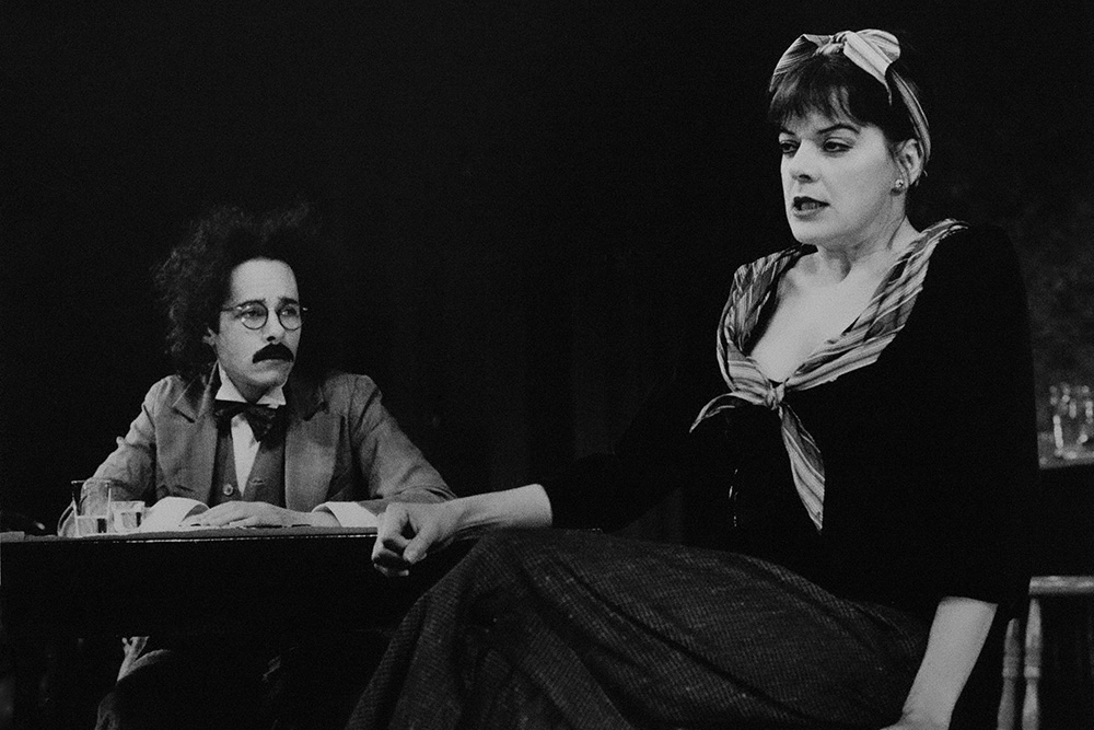 Production still for "Picasso at the Lapin Agile". L-R: Tyler Coppin as Einstein, Deborah Kennedy as Germaine. Photographer: Jeff Busby
