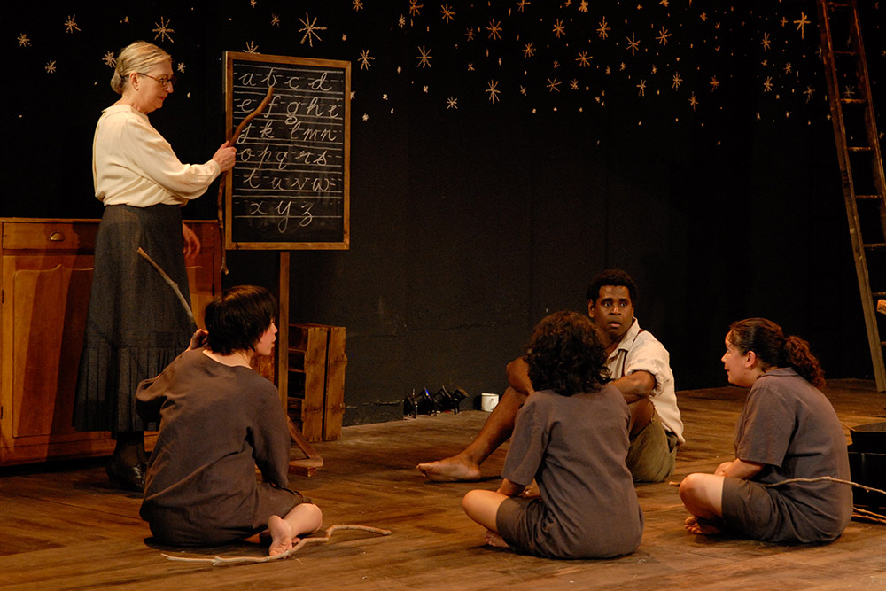 Production still for Sydney season of "Yibiyung". L-R: Annie Byron as the Teacher, Jada Alberts as Yirribin, Miranda Tapsell as Yibiyung, Jimi Bani as Smiley, Melodie Reynolds as Djindi . Photographer: Heidrun Löhr