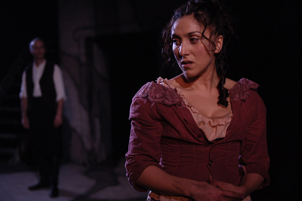 Production still for Adelaide production of "Translations". L-R: Stephen Sheehan as Yolland, Elena Carapetis as Maire. Photographer: Nick Hopton