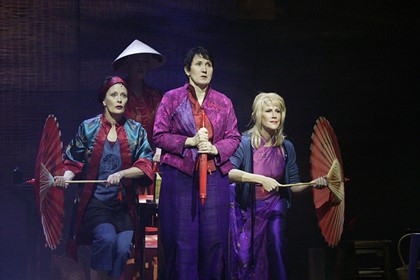 Production still for "Minefields and Miniskirts" (2004). L-R: Debra Byrne as The Nurse, Robyn Arthur as The Volunteer, Wendy Stapleton as The Entertainer. Photographer: Lisa Tomasetti