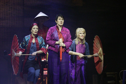 Production still for "Minefields and Miniskirts" (2004). L-R: Debra Byrne as The Nurse, Robyn Arthur as The Volunteer, Wendy Stapleton as The Entertainer. Photographer: Lisa Tomasetti