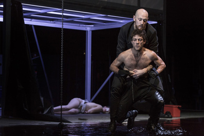 Production still for "Antigone". L-R: Emily Milledge, Josh Price (top), Aaron Orzech. Photographer: Pia Johnson